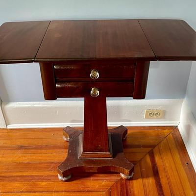 Antique Empire style drop-leaf end table