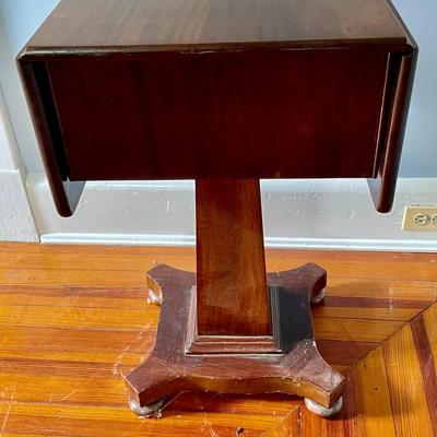 Antique Empire style drop-leaf end table