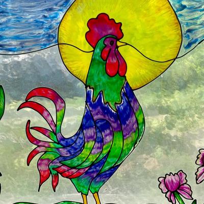 Vintage stained glass rooster and sun window