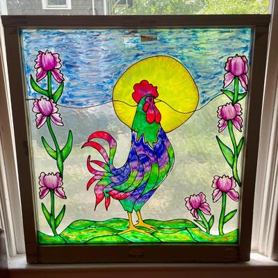 Vintage stained glass rooster and sun window