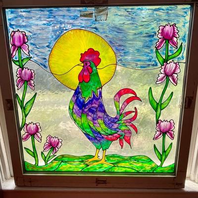 Vintage stained glass rooster and sun window