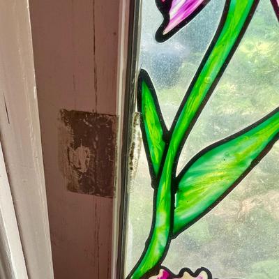 Vintage stained glass rooster and sun window