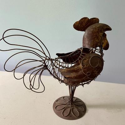 Pair of metal rooster candle holders