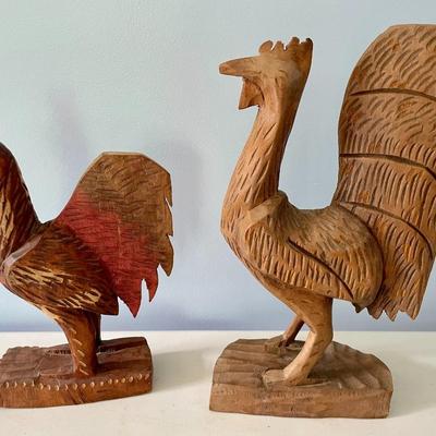 Pair of carved wooden roosters