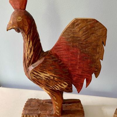 Pair of carved wooden roosters