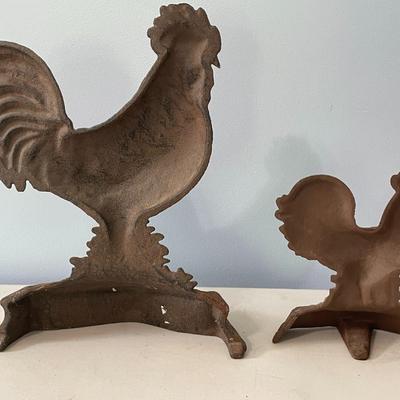 Pair of vintage cast iron metal rooster doorstops