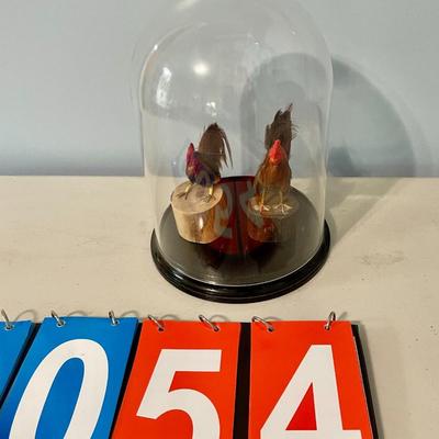 Pair of feathered rooster figurines "under glass"