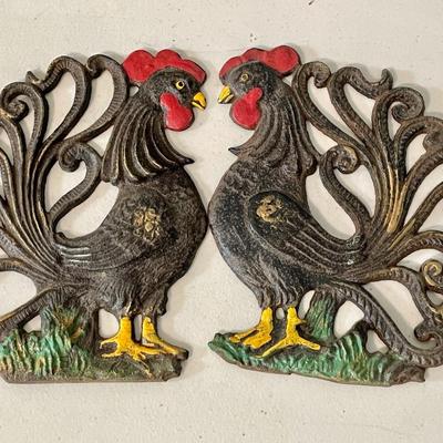 Pair of rooster oven mitts & painted cast iron rooster wall hangings