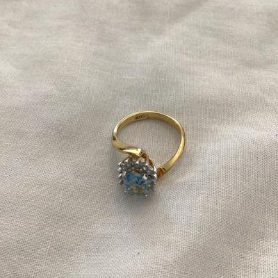 Sale Photo Thumbnail #207: Beautiful 18 karat gold filled vintage fashion ring with baby blue rhinestone size 7 1/2 please see attached photos