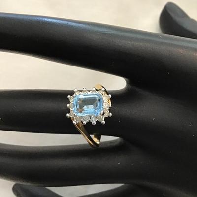 Sale Photo Thumbnail #206: Beautiful 18 karat gold filled vintage fashion ring with baby blue rhinestone size 7 1/2 please see attached photos