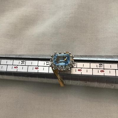 Sale Photo Thumbnail #208: Beautiful 18 karat gold filled vintage fashion ring with baby blue rhinestone size 7 1/2 please see attached photos