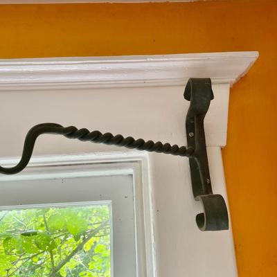 Antique wrought iron mounted plant hanger