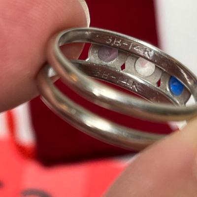 Lot 533 14K white gold mother's ring