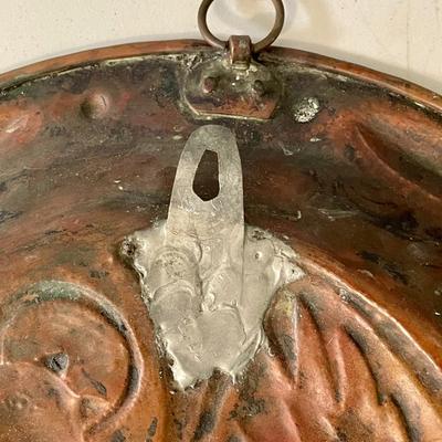 Antique copper repousse charger plate