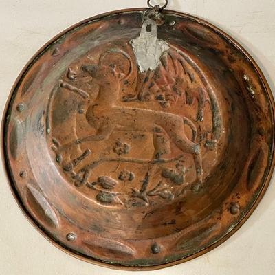 Antique copper repousse charger plate