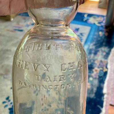 Lot of 7 vintage milk bottles