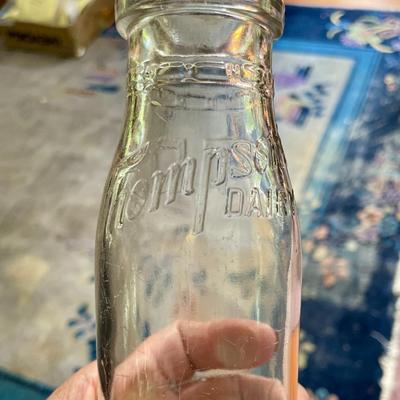 Lot of 7 vintage milk bottles