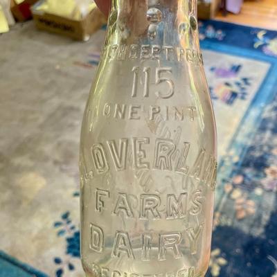 Lot of 7 vintage milk bottles