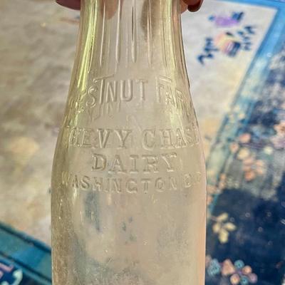 Lot of 7 vintage milk bottles