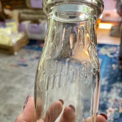 Lot of 7 vintage milk bottles