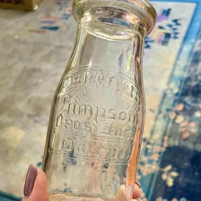 Lot of 7 vintage milk bottles