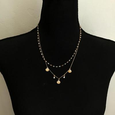 Pretty elegant, gold tone, seashell layered necklace