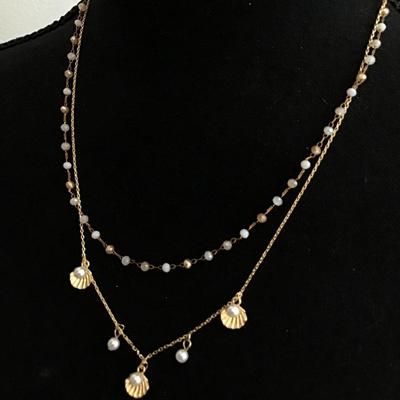 Pretty elegant, gold tone, seashell layered necklace