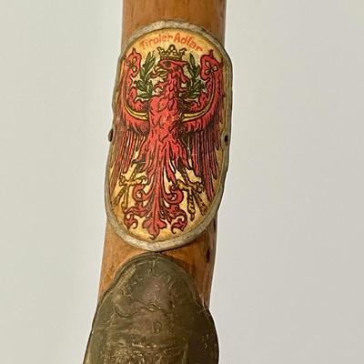 Pair of antique German Alpine walking canes with badges