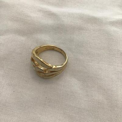 18 karat gold, plated fashion ring with white enamel