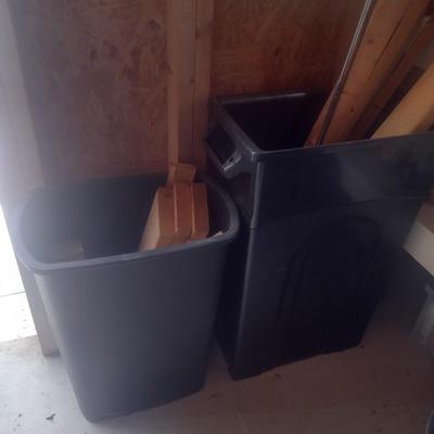 Pair of Composite Trash Receptacles and Wood Remnants