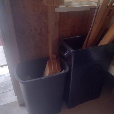 Pair of Composite Trash Receptacles and Wood Remnants