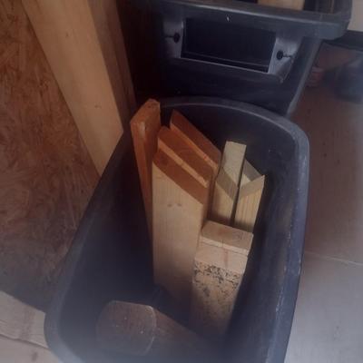 Pair of Composite Trash Receptacles and Wood Remnants
