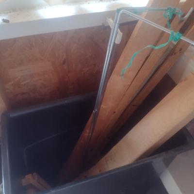 Pair of Composite Trash Receptacles and Wood Remnants