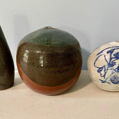 Three vintage Japanese-style bud vases
