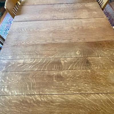 Antique tiger oak expandable claw-foot table & 6 oak chairs