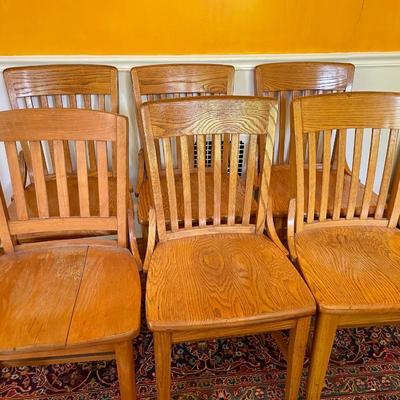Antique tiger oak expandable claw-foot table & 6 oak chairs