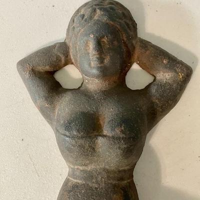 Antique cast iron boot jack "Naughty Nellie"