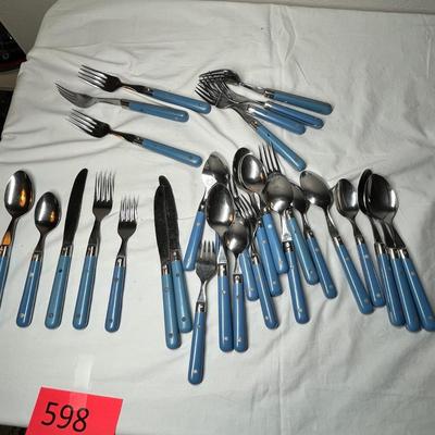 Lot 598 Blue handle flatware