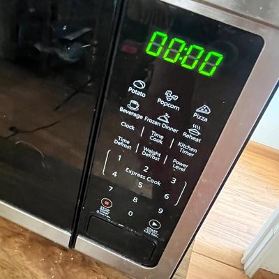 Lot 607 Microwave and stand