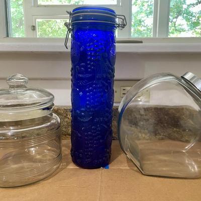 Trio of glass canisters