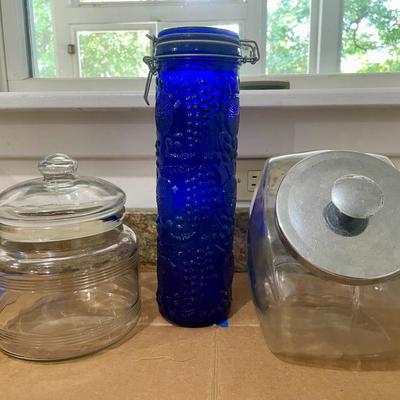 Trio of glass canisters