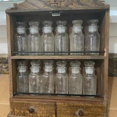 Vintage wall-mounted spice rack
