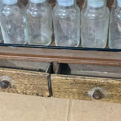Vintage wall-mounted spice rack
