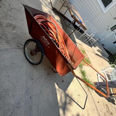 Lot 635 Garden cart w/ hose