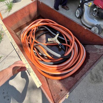 Lot 635 Garden cart w/ hose