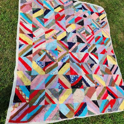 Sale Photo Thumbnail #117: This auction lot is for a Colorful Crazy-Patch with Pigtails Quilt.  This quilt is clean and ready for use.  In nice condition.  Straight from the cedar chest. Measures about 80X64-inches.