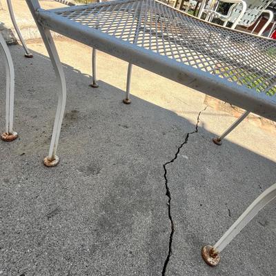 Lot 638 White metal patio chairs