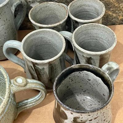 Mixed lot of 12 hand-thrown pottery mugs