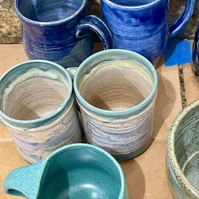 Mixed lot of 12 hand-thrown pottery mugs