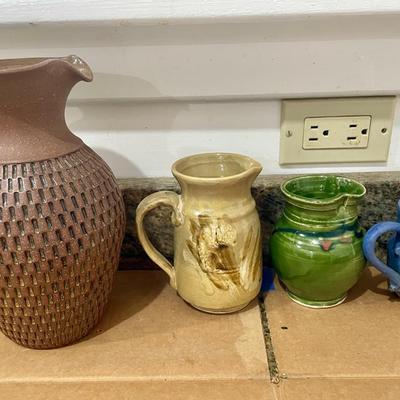 Lot of 4 hand-thrown pottery pitchers & creamers + hand-thrown loaf pan